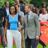 Michelle Obama et David Beckham jouent au football pour la campagne Let's Move! de la première dame. Londres, juillet 2012.
