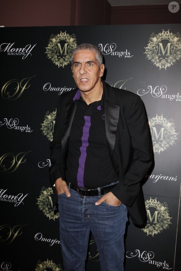 Samy Naceri assiste au défilé de mode Omar Jeans, au pavillon Champs-Elysées, à Paris le 31 mars 2013