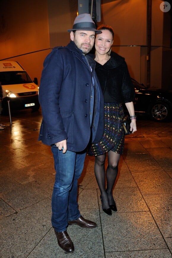 Clovis Cornillac et Lilou Fogli arrivent à l'Hôtel d'Evreux pour le défilé haute couture Alexis Mabille printemps-été 2014. Paris, le 20 janvier 2014.