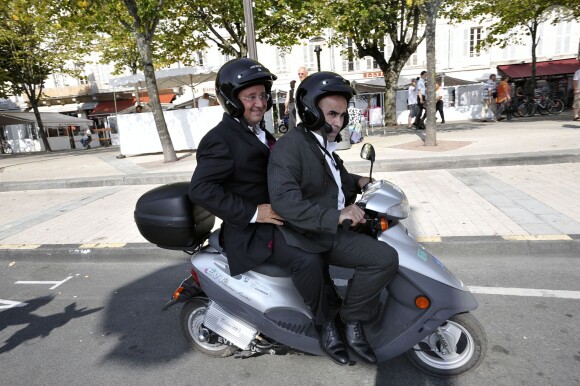 Rachid Kesri et François Hollande en scooter à La Rochelle, le 31 août 2008. 