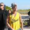 Justin Bieber fait du Segway sur la plage à Miami, le 22 janvier 2014.