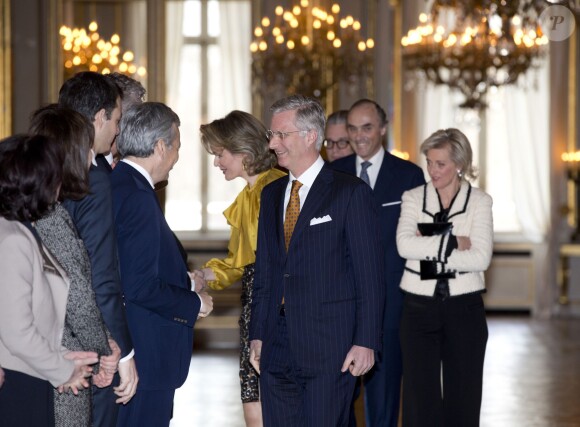 Le roi Philippe de Belgique et la famille royale arrivant pour la cérémonie des voeux du souverain aux corps constitués, le 29 janvier 2014 au palais royal, à Bruxelles.