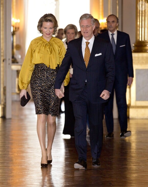 Le roi Philippe de Belgique et son épouse la reine Mathilde arrivent avec la princesse Astrid, le prince Lorenz, le prince Laurent et la princesse Claire lors des voeux du souverain aux corps constitués le 29 janvier 2014 au palais royal à Bruxelles.