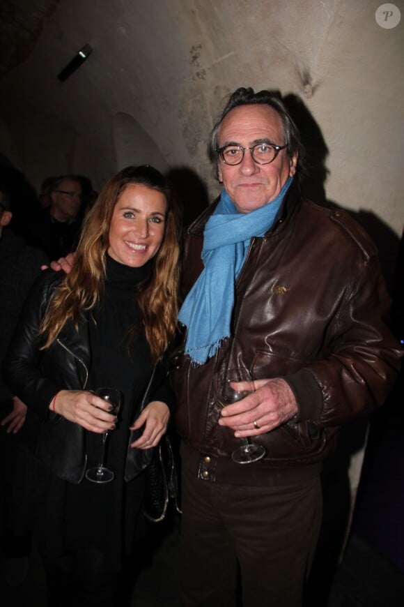 Sandrine Diouf et Philippe Lavil lors de la soirée pour le 10e anniversaire de la disparition de l'acteur Ticky Holgado au restaurant "O Mantra" à Paris le 30 janvier 2014.