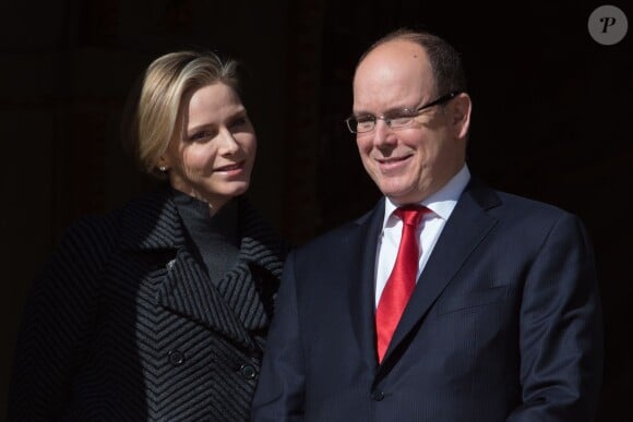 Le prince Albert II et la princesse Charlene de Monaco à Sainte Devote à Monaco le 27 janvier 2014