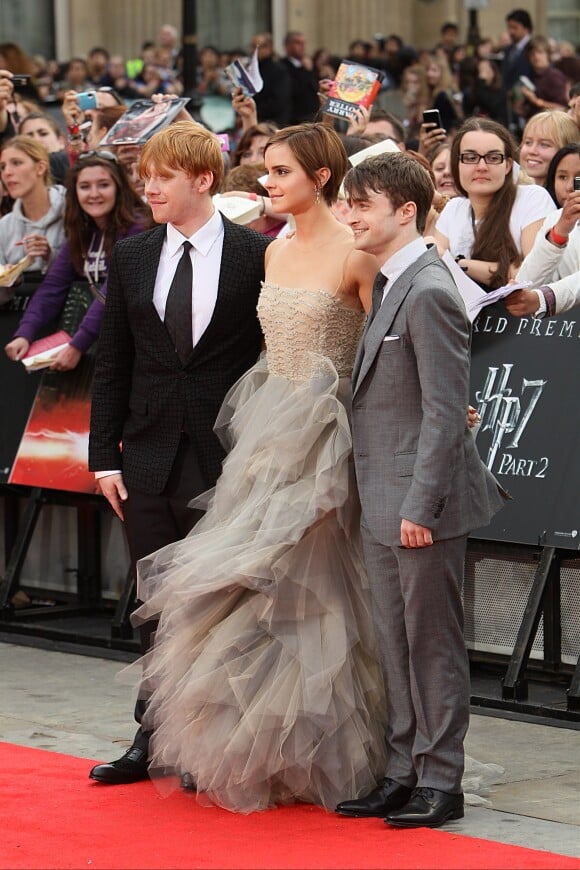 Rupert Grint, Emma Watson et Daniel Radcliffe lors de la première mondiale de Harry Potter et les reliques de la mort - partie II à Londres le 7 juillet 2011