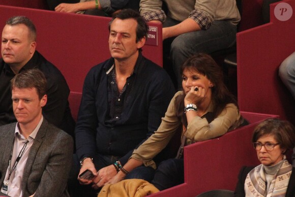 Jean-Luc Reichmann et sa compagne Nathalie assistent à la finale de l'Open GDF Suez au Stade Pierre de Coubertin à Paris le 2 fevrier 2014