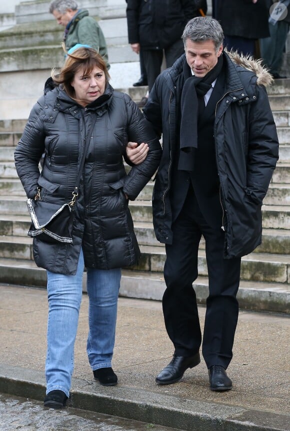 Michèle Bernier et Bruno Gaccio à la sortie des obsèques de François Cavanna au Père Lachaise à Paris. Le 6 février 2014.