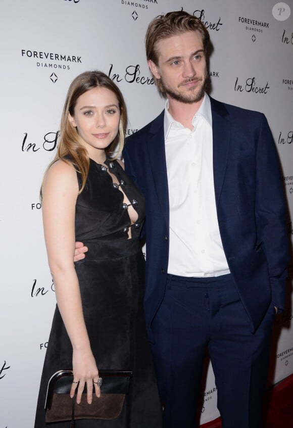 Elizabeth Olsen et Boyd Holbrook à la première du film In Secret aux Arclight Cinemas, Los Angeles, le 6 février 2014.