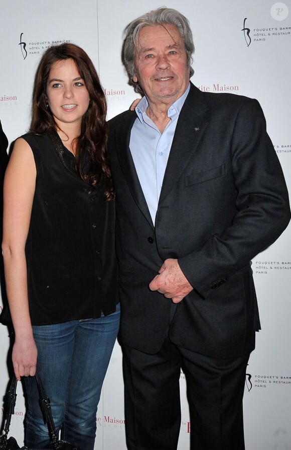 Alain Delon et sa fille Anouchka à l'hôtel Fouquet's Barrière à Paris le 22 Janvier 2013.