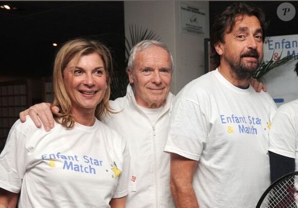 Michèle Laroque, Pierre Douglas, Henri Leconte lors du lancement de l'opération Sourire gagnant de l'association Enfant Star & Match à Levallois-Perret le 10 février 2014