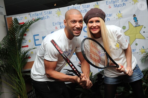 Tatiana et Xavier Delarue lors du lancement de l'opération Sourire gagnant de l'association Enfant Star & Match à Levallois-Perret le 10 février 2014