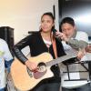 La chanteuse Zaho lors du lancement de l'opération Sourire gagnant de l'association Enfant Star & Match à Levallois-Perret le 10 février 2014