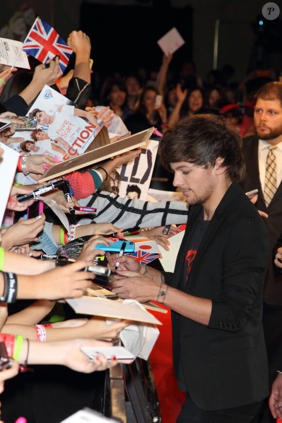 Louis Tomlinson des One Direction à la première du film 'This Is Us' au Japon, le 3 novembre 2013.