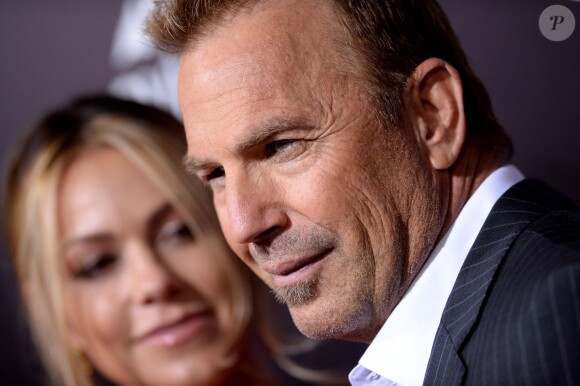 Kevin Costner et Christine Baumgartner à la première de "3 Days To Kill" à Los Angeles, le 12 février 2014.