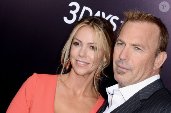 Kevin Costner et Christine Baumgartner à l'avant-première de "3 Days to Kill" à Los Angeles, le 12 février 2014.