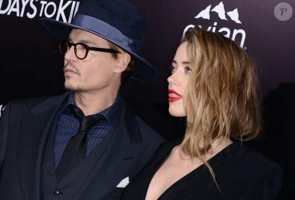 Johnny Depp et Amber Heard à l'avant-première de "3 Days to Kill" à Los Angeles, le 12 février 2014.