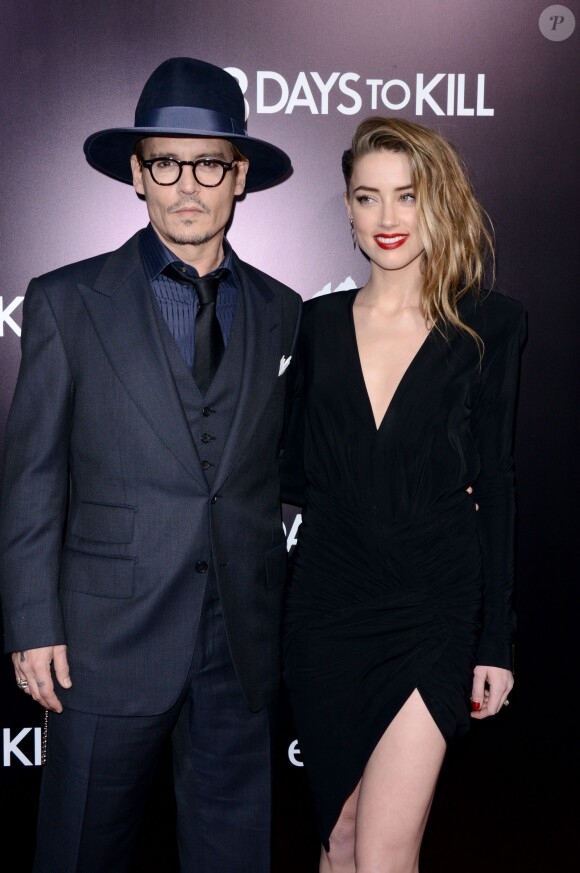 Johnny Depp et Amber Heard à l'avant-première de "3 Days to Kill" à Los Angeles, le 12 février 2014.