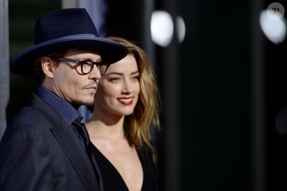 Johnny Depp et Amber Heard à l'avant-première de "3 Days to Kill" à Los Angeles, le 12 février 2014.