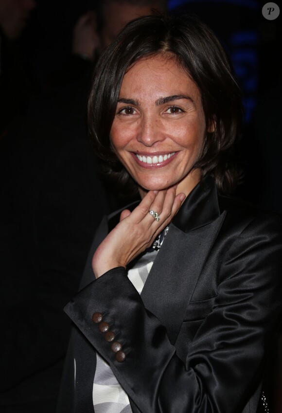 Inès Sastre arrive à la première du film Monuments Men à l'UGC Normandie à Paris le 12 février 2014.