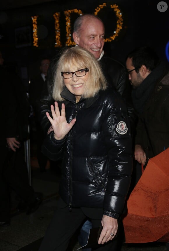 Mireille Darc et son mari Pascal Desprez arrivent à la première du film Monuments Men à l'UGC Normandie à Paris le 12 février 2014.