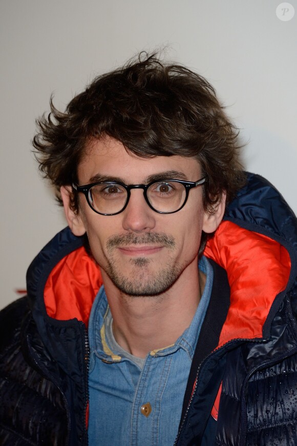 Hugo Gelin à la première du film Monuments Men à l'UGC Normandie à Paris le 12 février 2014.