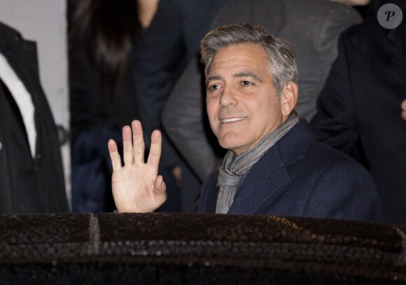 George Clooney arrive à la première du film Monuments Men à l'UGC Normandie à Paris le 12 février 2014.