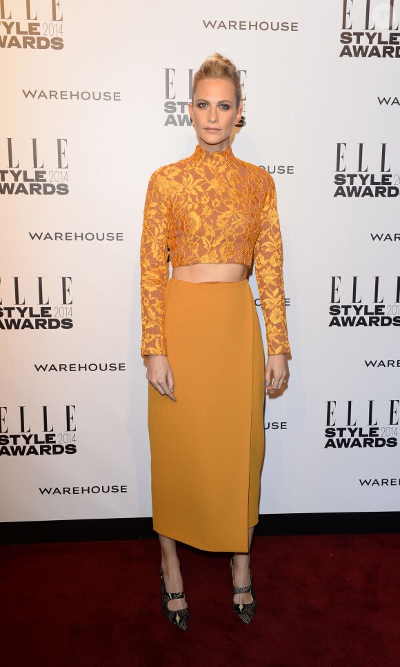 Poppy Delevingne assiste aux Elle Style Awards au One Embankment, à Londres. Le 18 février 2014.