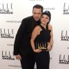 Le créateur Roland Mouret et Lily Allen, lauréate du prix d'artiste féminine britannique de l'année lors des Elle Style Awards au One Embankment, à Londres. Le 18 février 2014.