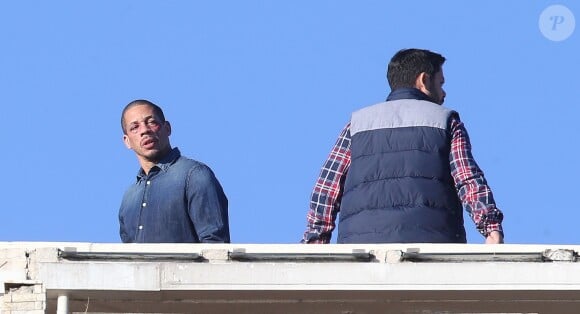 Exclusif - JoeyStarr et Manu Payet sur le tournage du long métrage policier "36 Heures à tuer", à Cannes, sur le toit du Grand Hôtel, le 11 février 2014