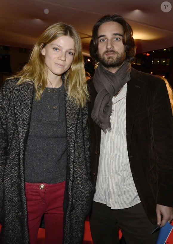 Le producteur Dimitri Rassam (fils de Carole Bouquet) et sa femme Masha Rassam lors de l'avant-première du film "Supercondriaque" au Gaumont Opéra à Paris, le 24 février 2014