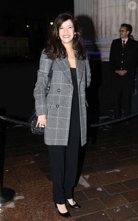 Mélanie Doutey arrive à la Bourse du Commerce pour assister au défilé Etam. Paris, le 25 février 2014.