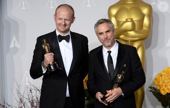 Alfonso Cuaron et Mark Sanger (montage Gravity) lors de la cérémonie des Oscars le 2 mars 2014