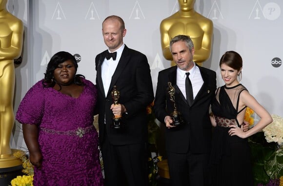 Alfonso Cuaron et Mark Sanger lors de la cérémonie des Oscars le 2 mars 2014