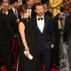 Olivia Wilde enceinte et son fiancé Jason Sudeikis, lors de la 86e cérémonie des Oscars à Hollywood, le 2 mars 2014