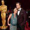 Elsa Pataky (dans une robe Elie Saab) enceinte et son mari Chris Hemsworth, lors de la 86e cérémonie des Oscars à Hollywood, le 2 mars 2014