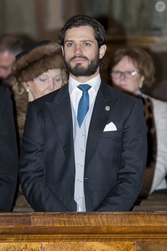Le prince Carl Philip de Suède à la chapelle du palais royal à Stockholm le 2 mars 2014 pour la messe d'action de grâce en l'honneur de la naissance de la princesse Leonore, fille de la princesse Madeleine et de Chris O'Neill.