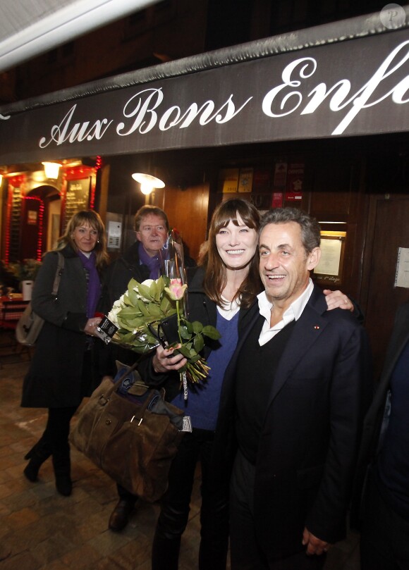 Exclusif - Nicolas Sarkozy et sa femme Carla Bruni sont allés dîner au restaurant "Aux Bons Enfants" à Cannes pour fêter la Saint Valentin, après le concert de Carla Bruni au palais des festivals à Cannes. Le couple était accompagné du président du conseil général des Alpes-Maritimes Éric Ciotti et du député David Lisnard. Le 14 février 2014