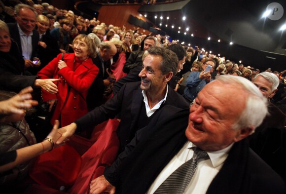 Exclusif - Aux concerts de Carla, Nicolas Sarkozy aussi est accueilli en star. Ici lors du passage de la chanteuse à Cannes le 14 février 2014.