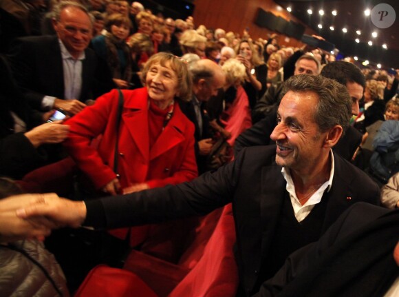 Exclusif - Aux concerts de Carla, Nicolas Sarkozy aussi est accueilli en star. Ici lors du passage de la chanteuse à Cannes le 14 février 2014.