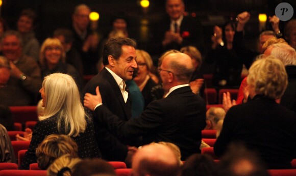Exclusif - Aux concerts de Carla, Nicolas Sarkozy aussi est accueilli en star. Ici lors du passage de la chanteuse à Cannes le 14 février 2014.