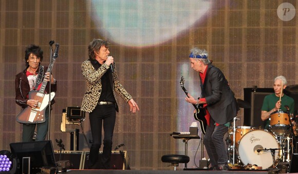Ronnie Wood, Mick Jagger, Keith Richards et Charlie Watts lors du concert des Rolling Stones à Londres. Juillet 2013.