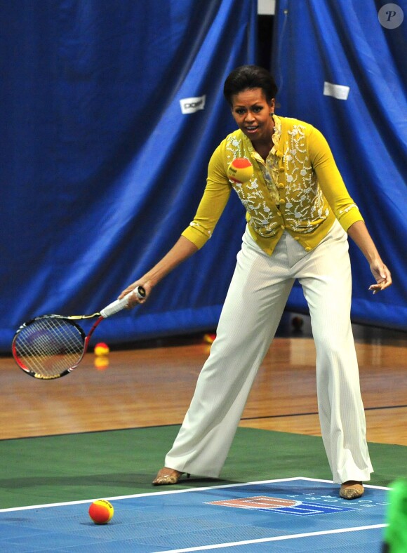 Michelle Obama porte un gilet L'Wren Scott pour une séance de tennis à Washington. Mars 2012.