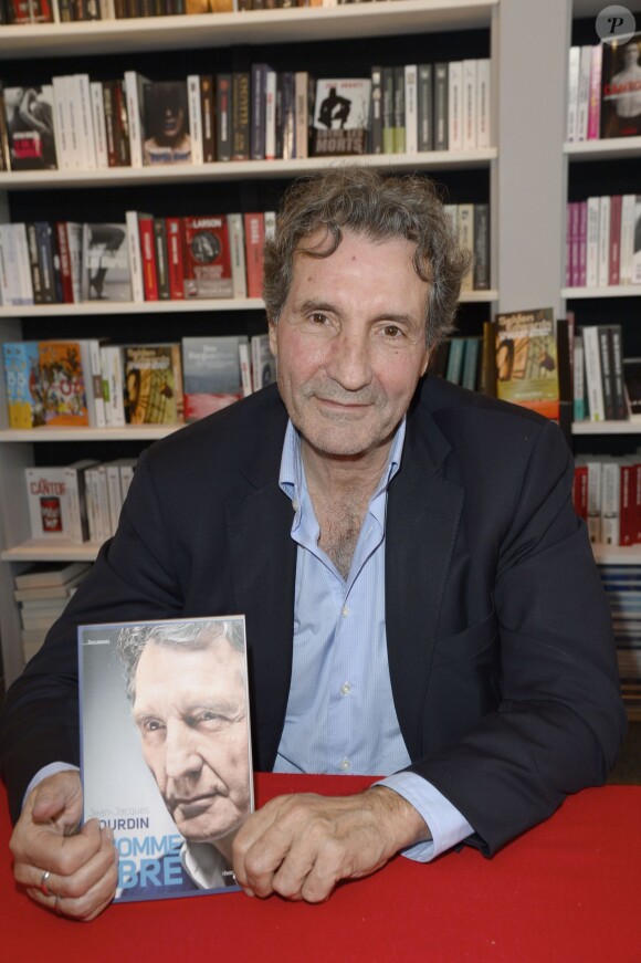 Jean-Jacques Bourdin à la 34e édition du Salon du Livre à Paris, Porte de Versailles, le 22 mars 2014.
