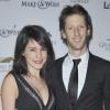 Romain Grosjean et sa femme Marion Jollès lors du dîner de Gala du 92e Grand Prix d'Amérique au Grand Palais à Paris le 26 janvier 2013