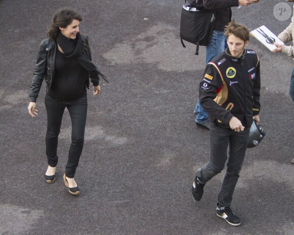 Romain Grosjean et son épouse Marion Jollès dans les allées du Grand Prix de Monaco, le 25 mai 2013