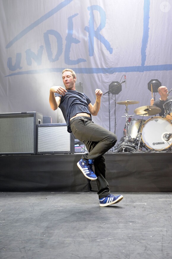 Chris Martin et Coldplay au concert de charité "Under 1 Roof" au Eventim Apollo à Londres, le 19 décembre 2013.