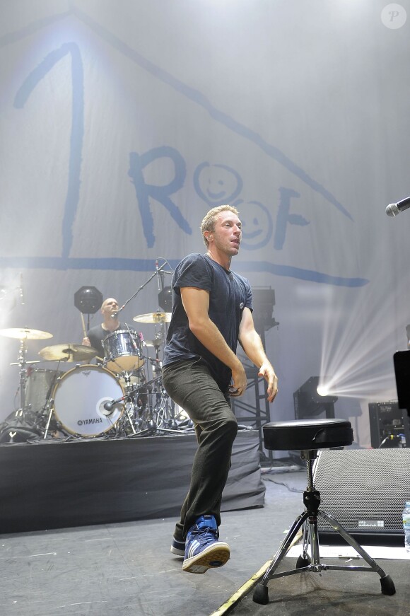 Chris Martin et Coldplay au concert de charité "Under 1 Roof" au Eventim Apollo à Londres, le 19 décembre 2013.