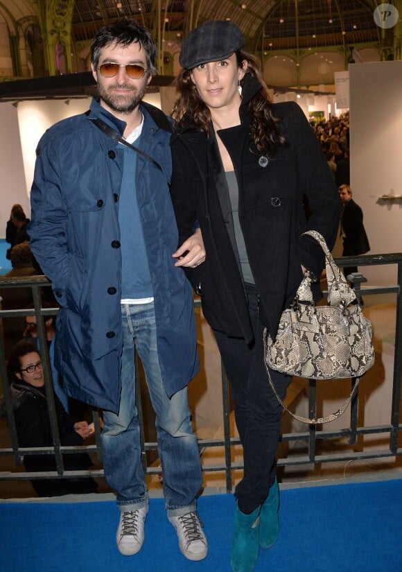 Mathieu Demy et sa compagne à l'inauguration de l'exposition "Art Paris Art Fair" au Grand Palais, à Paris le 26 mars 2014.