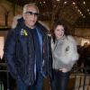 Gérard Darmon et Sarah Guetta la coiffeuse des stars, à l'inauguration de l'exposition "Art Paris Art Fair" au Grand Palais, à Paris le 26 mars 2014.